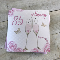 Happy 85th Birthday Card Nanny Champagne Glasses Pink Roses by White Cotton Cards SS42-NNY85