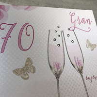 Happy 70th Birthday Card Gran Champagne Glasses Pink Roses by White Cotton Cards SS42-GRAN70